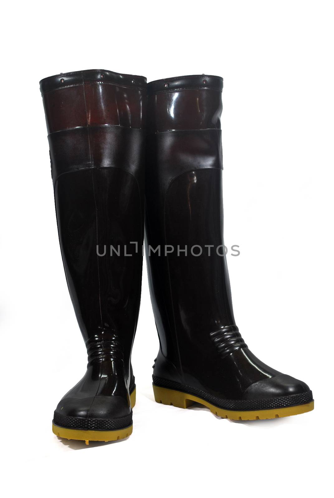 Brown waterproof rubber boots isolated on white background.(with Clipping Path).
