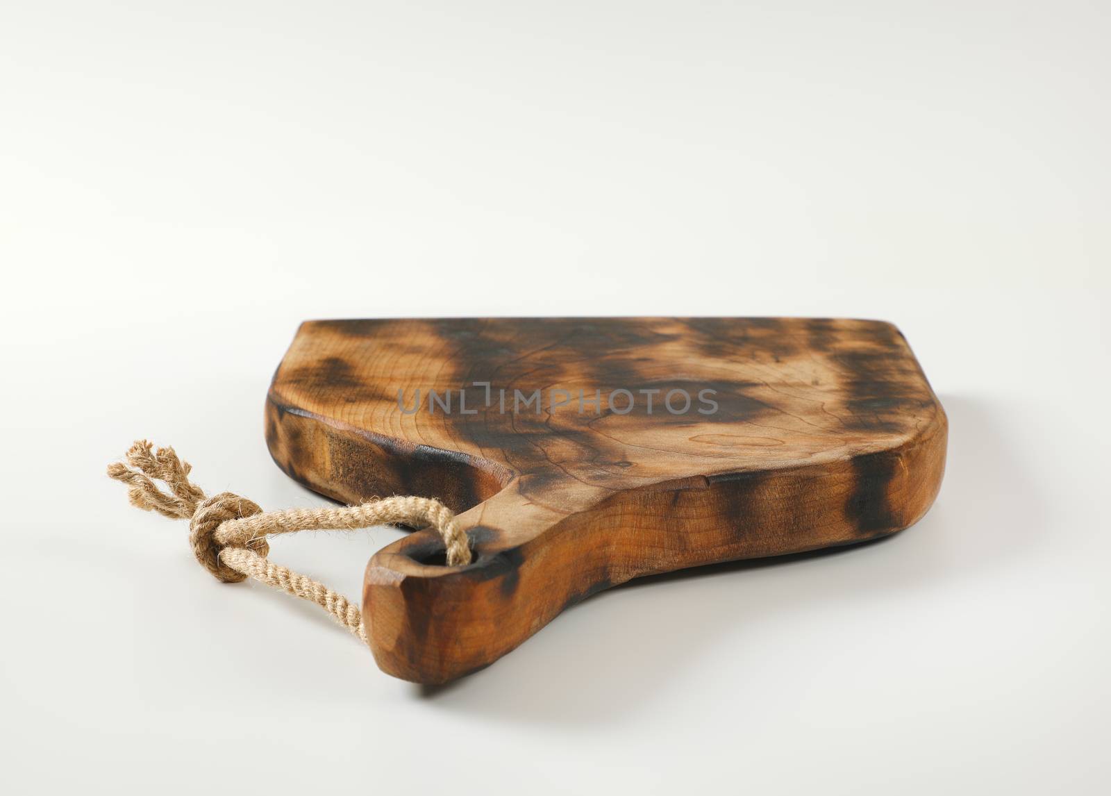 Handcrafted rustic wooden cutting and serving board