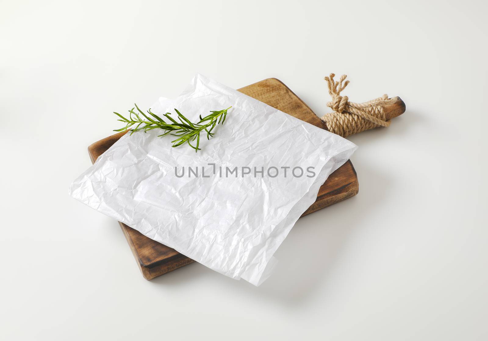 White butcher paper on cutting board by Digifoodstock