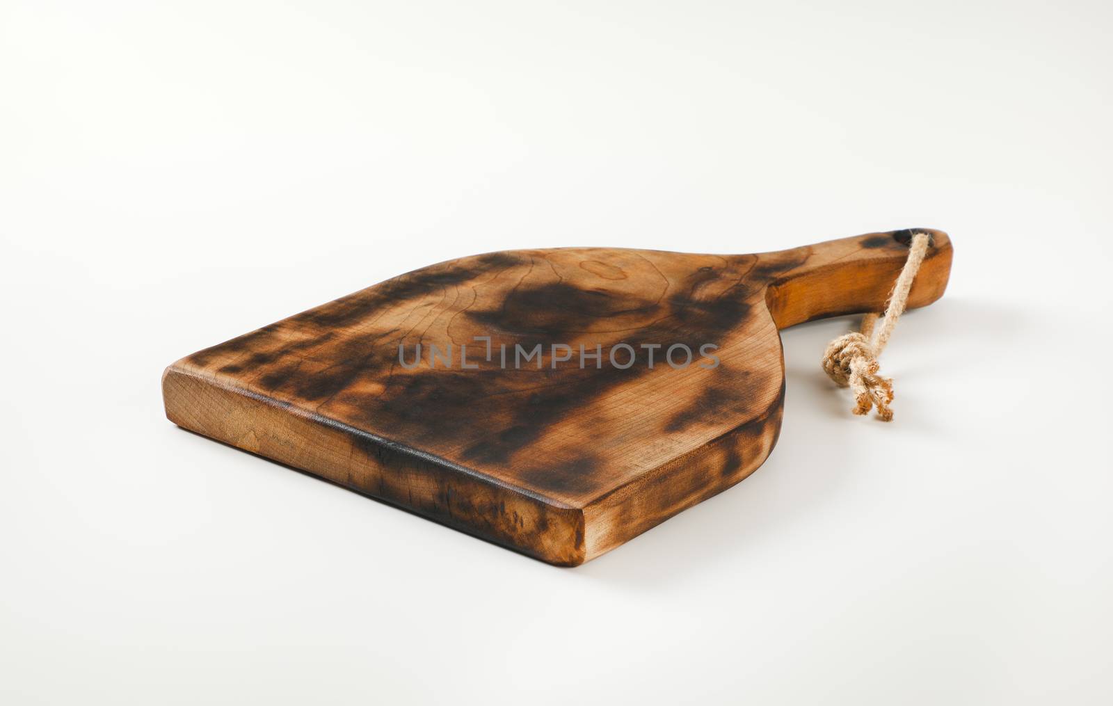 Rustic paddle shaped cutting board by Digifoodstock
