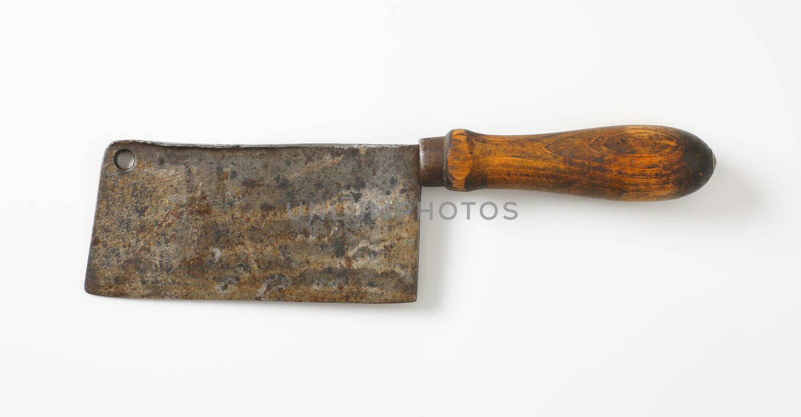 Old wood-handled meat cleaver by Digifoodstock