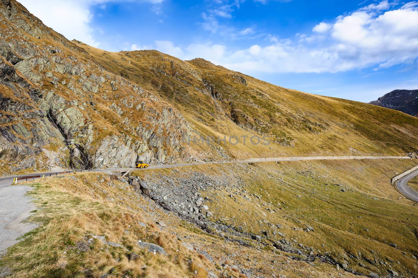 View to Transfagarasan road. It is a paved mountain road crossing the southern section of the Carpathian Mountains of Romania. It has national-road ranking and is the second-highest paved road in the country after the Transalpina.