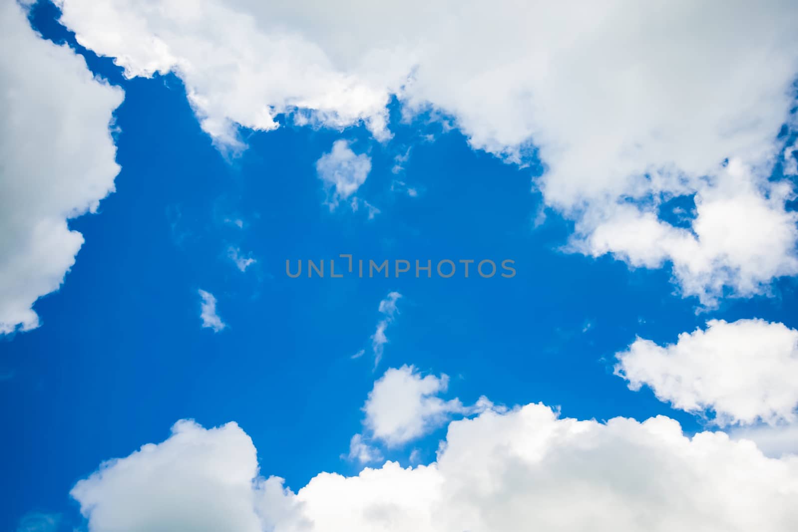 Clouds and blue sky for background.