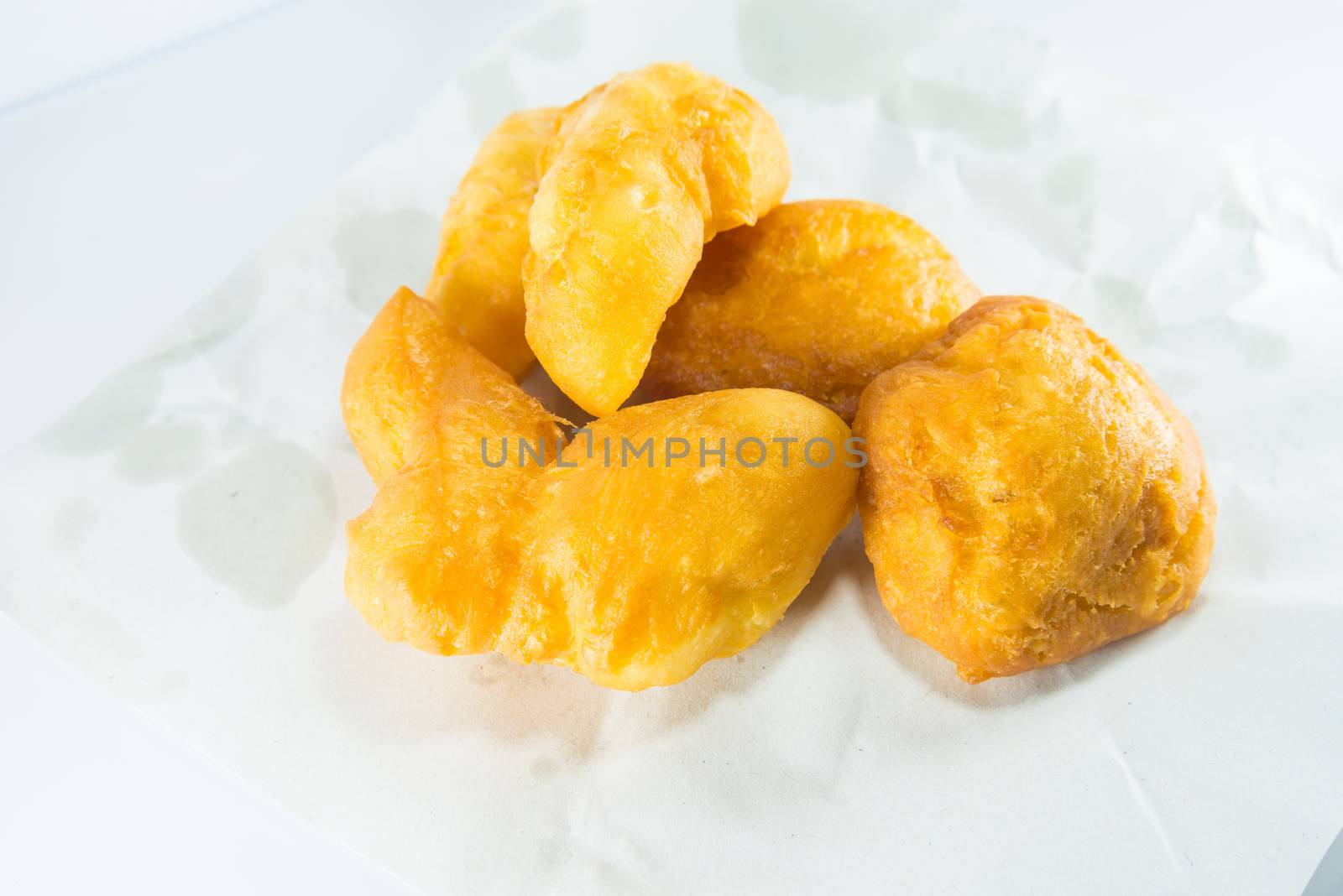 deep fried dough stick on white background, fried bread