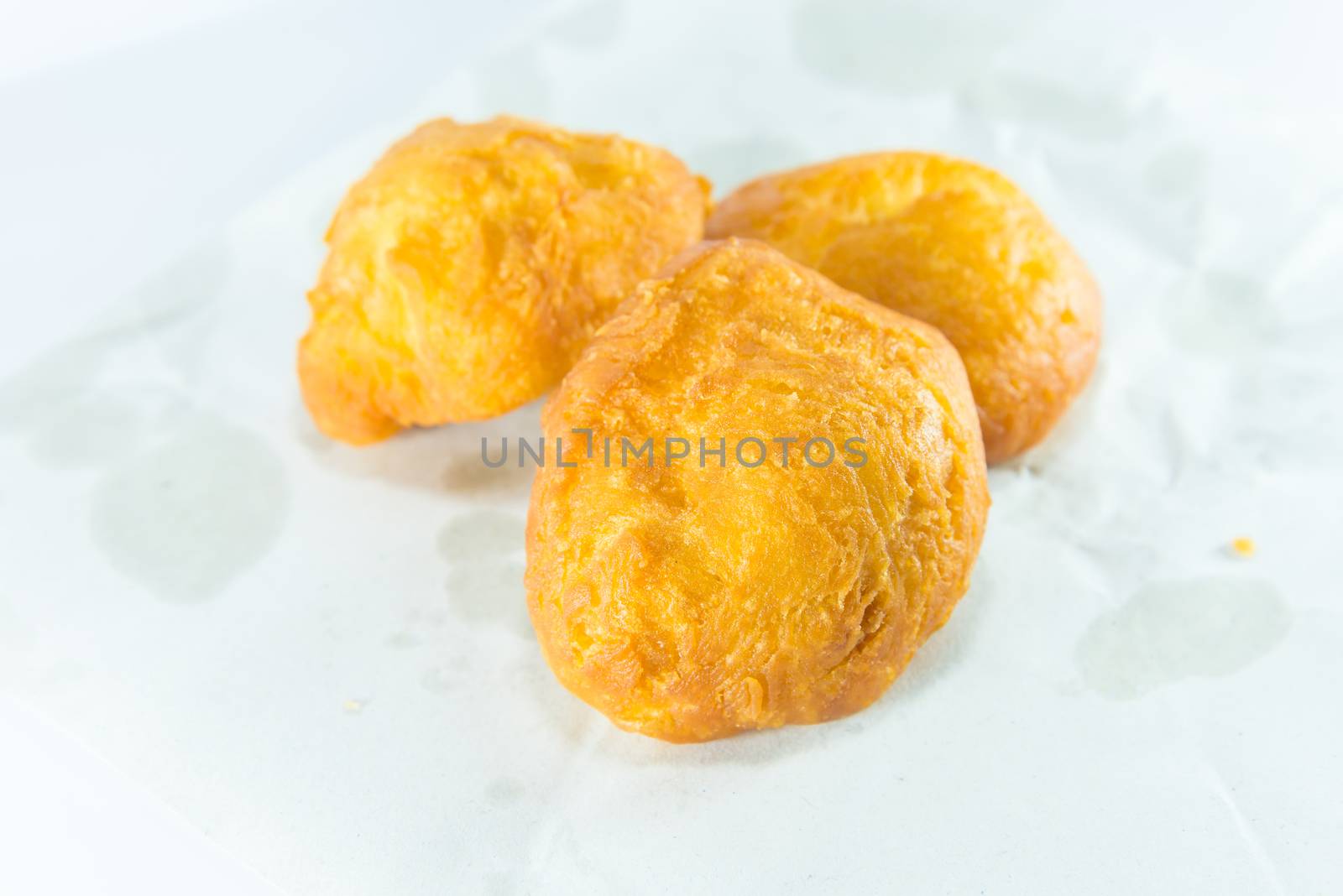 deep fried dough stick on white background, fried bread
