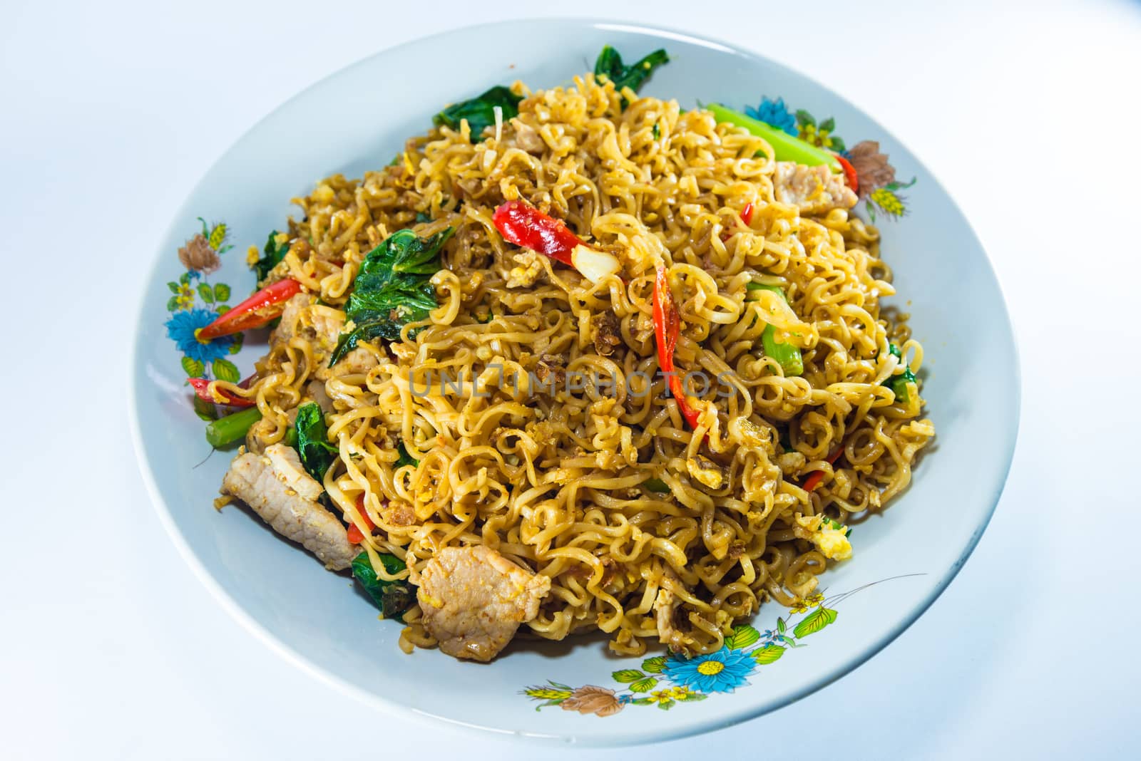 fried noodles on white background.