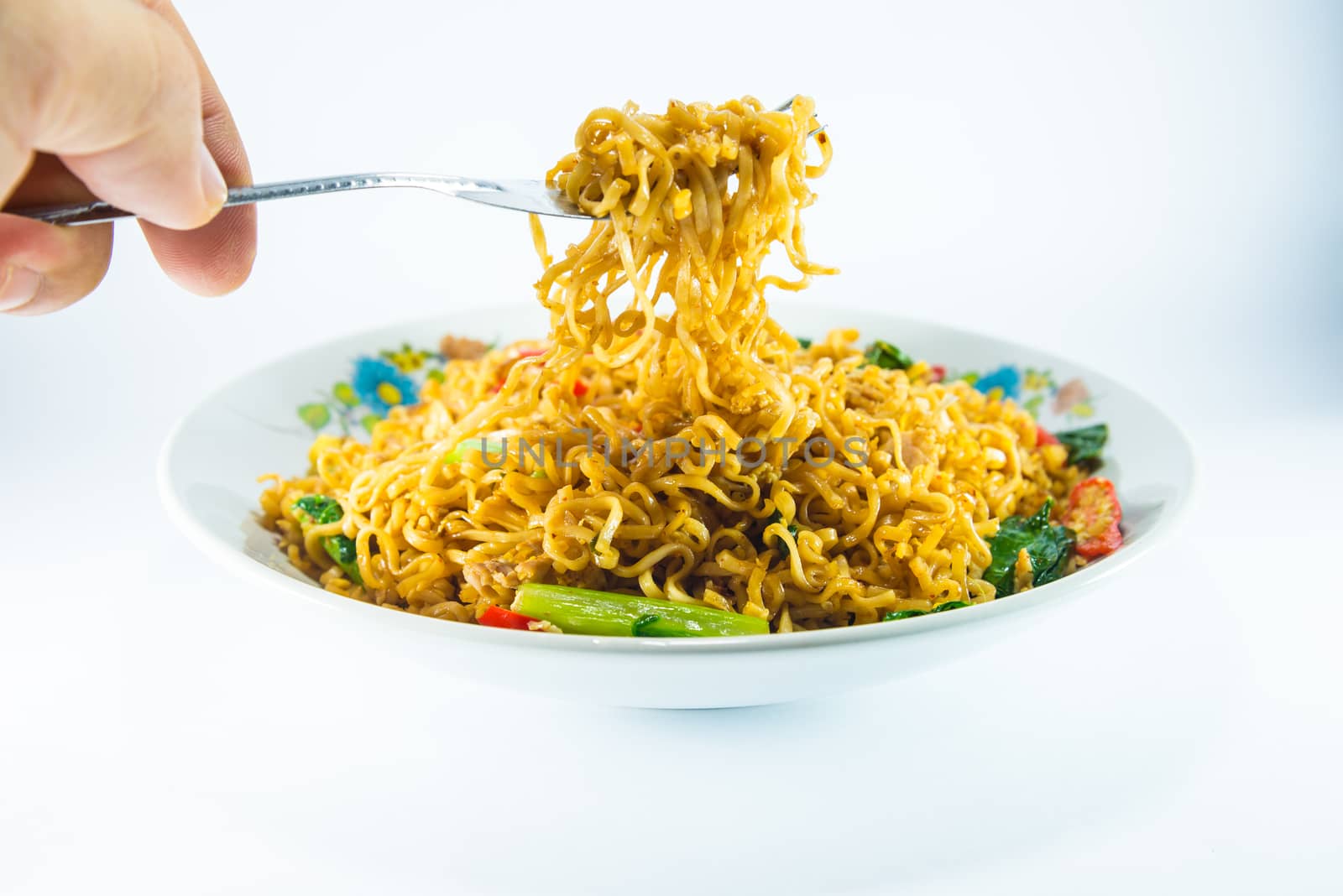 fried noodles on white background.