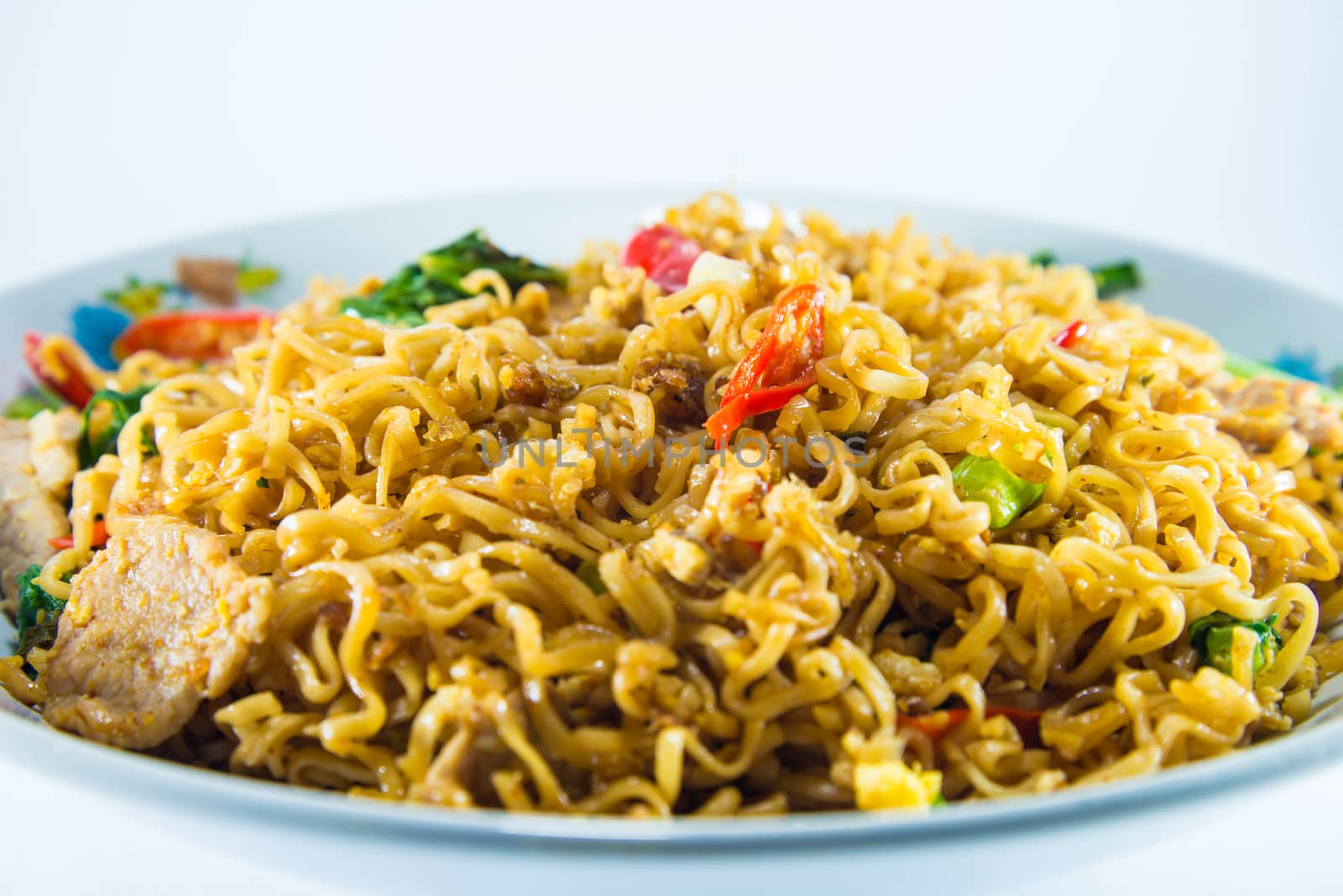 fried noodles on white background.