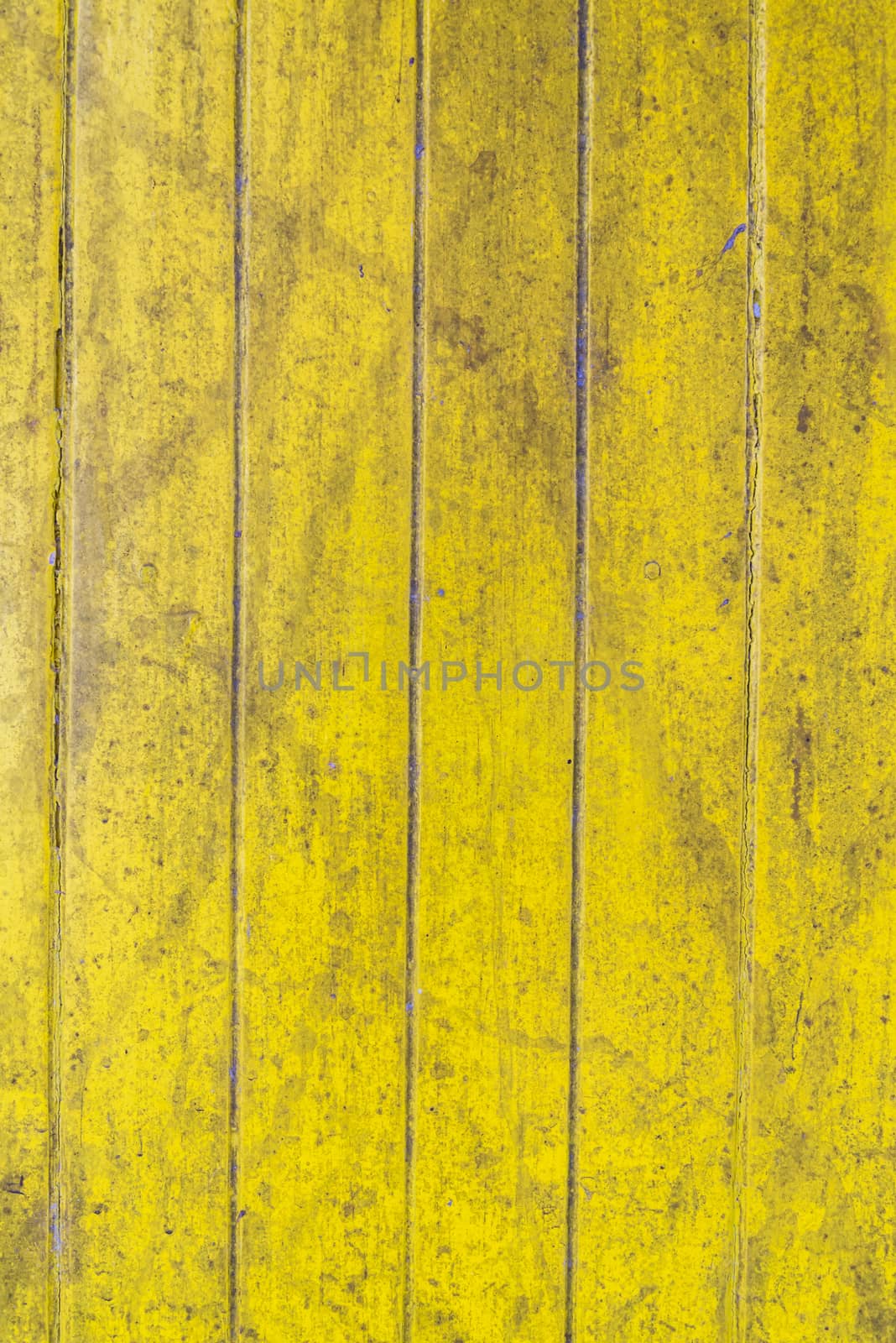 Oil slick on old wooden door for background.