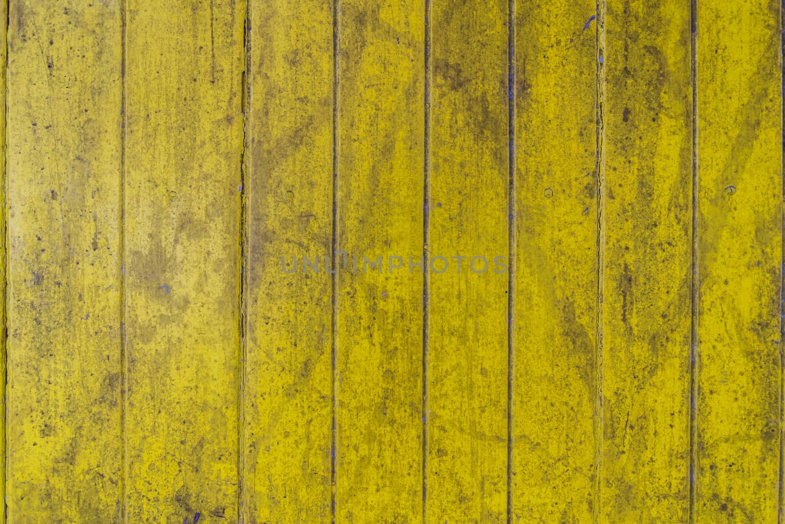 Oil slick on old wooden door for background.