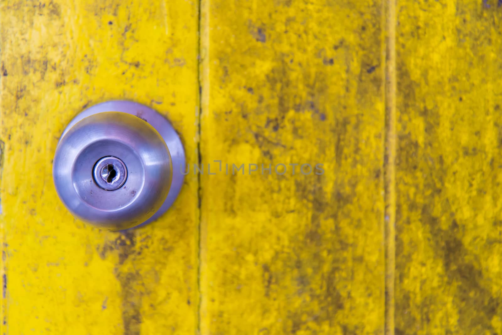 Oil slick on old wooden door for background.