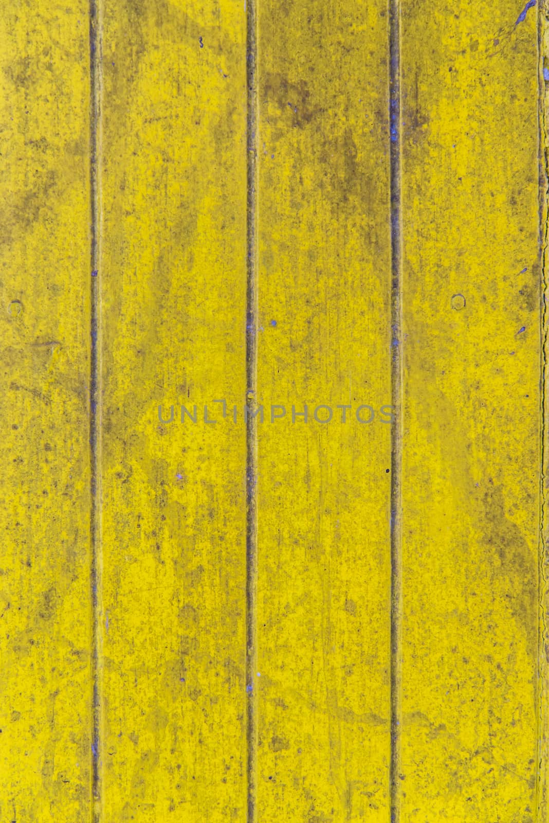 Oil slick on old wooden door for background.