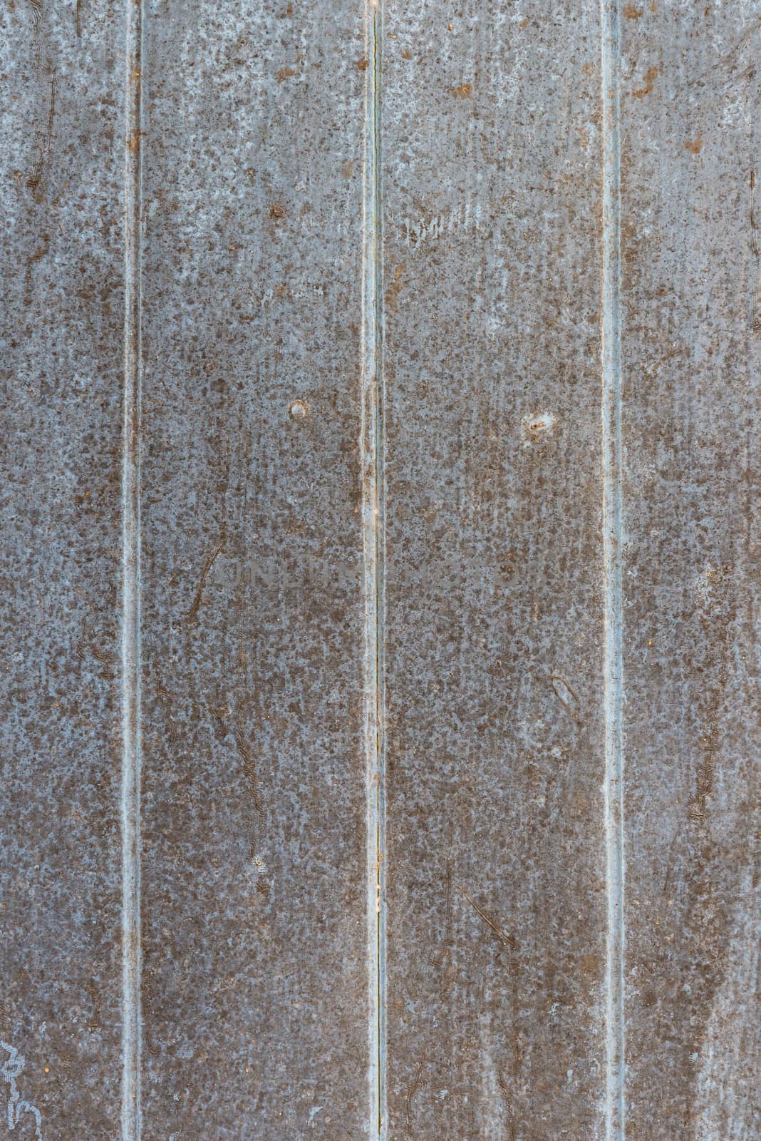 Oil slick on old wooden door for background.