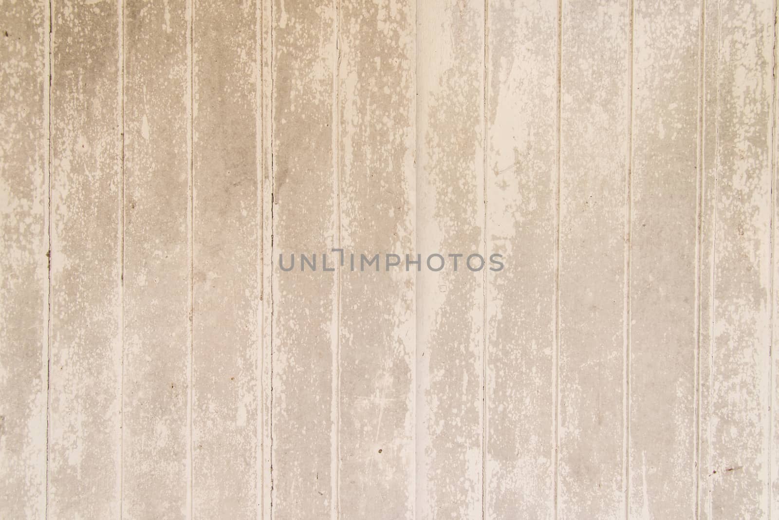 Oil slick on old wooden door for background.