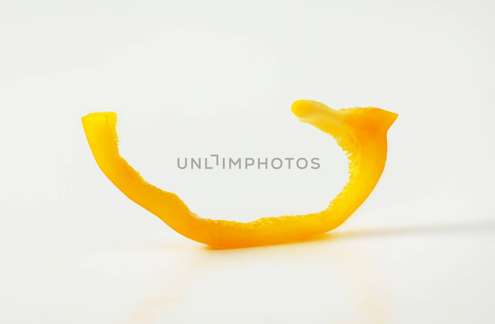 Yellow bell pepper slice by Digifoodstock