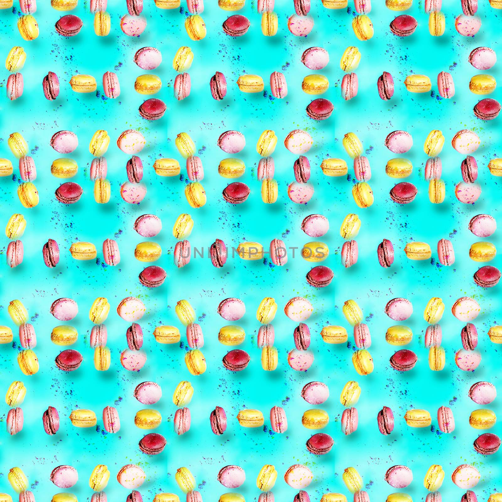 Abstract seamless pattern with flying colored macaroons, holiday concept