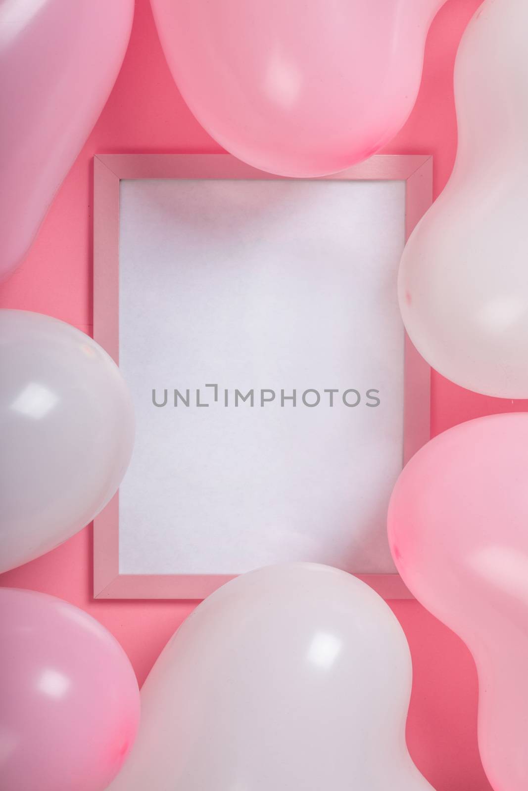 Happy valentines day greetings many heart shaped pink balloons and foto frame with copy space for text , background border flat lay with copy space for text