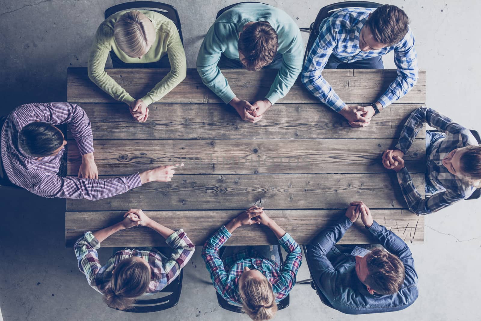 Business people team around table by ALotOfPeople