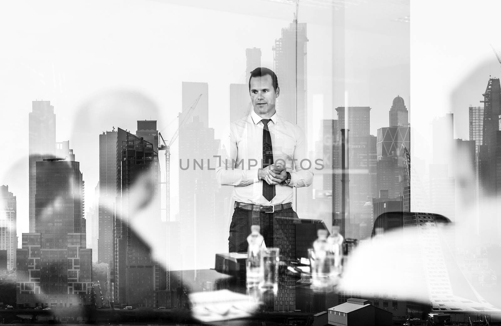 Confident company leader on business meeting against new york city manhattan buildings and skyscrapers window reflection. by kasto