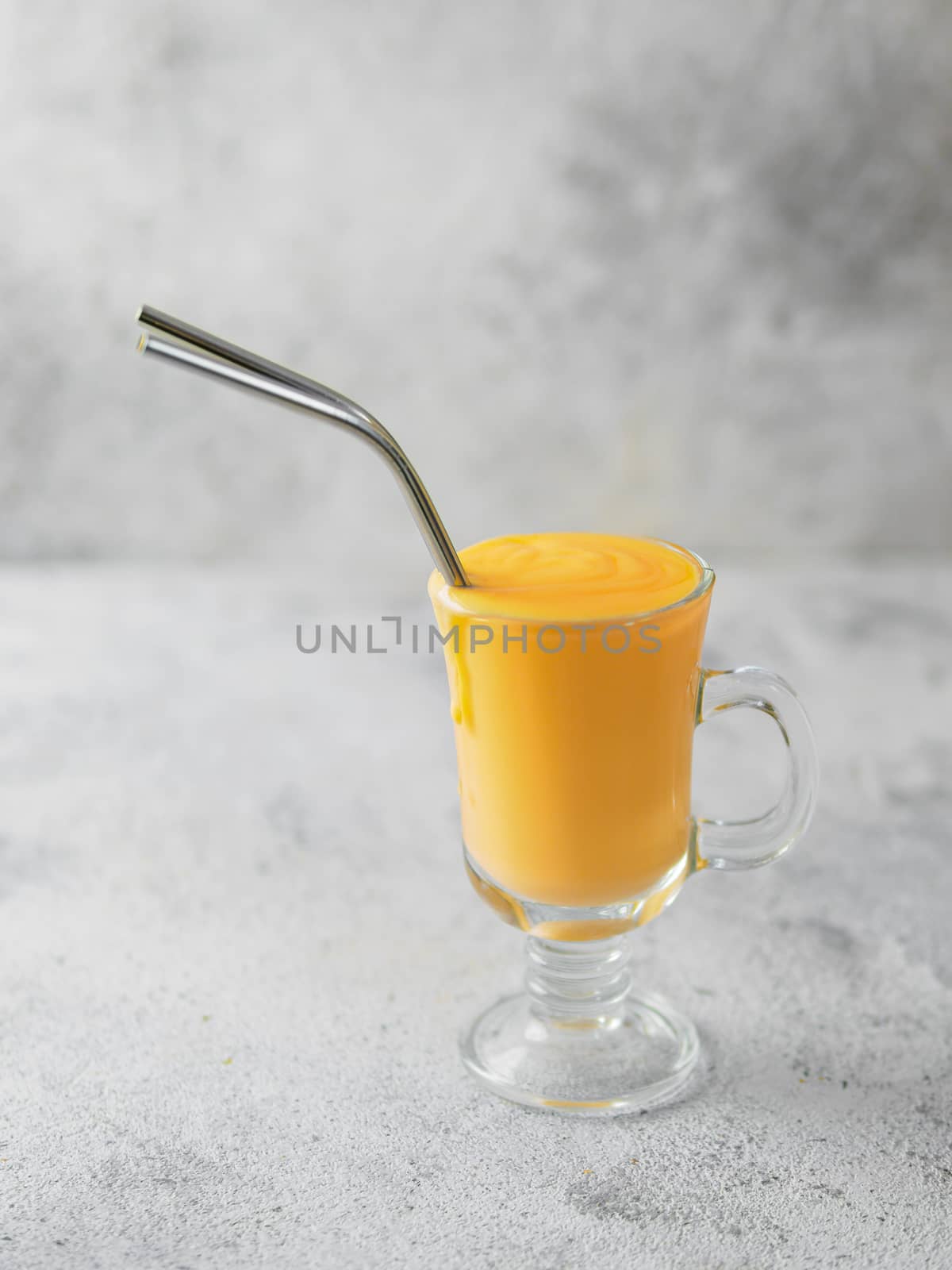 Yellow milkshake with metal straws, sopy space by fascinadora