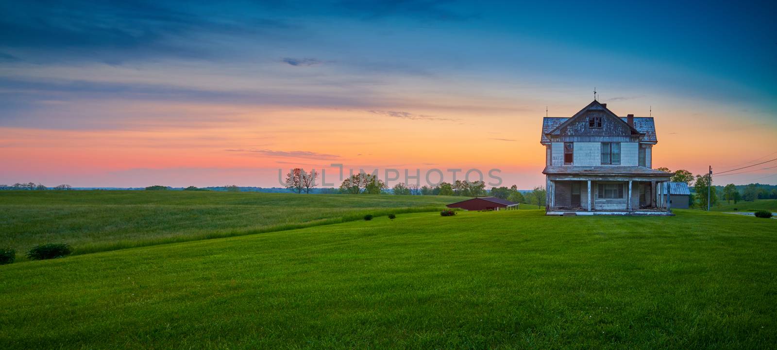 Abandoned Old Farm House at Dusk by patrickstock