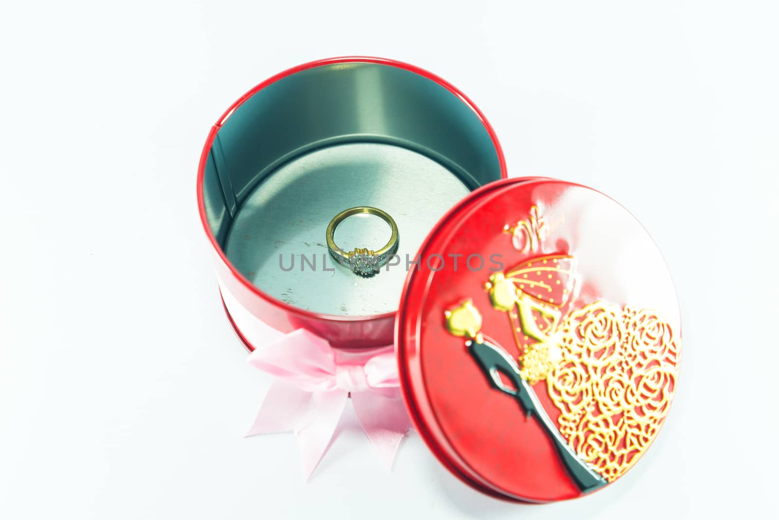 Box of red spheres on white background.