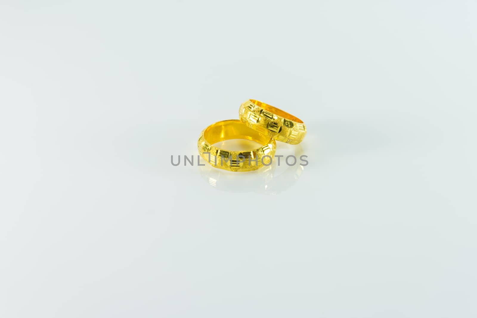 Twin Ring Gold on white background.