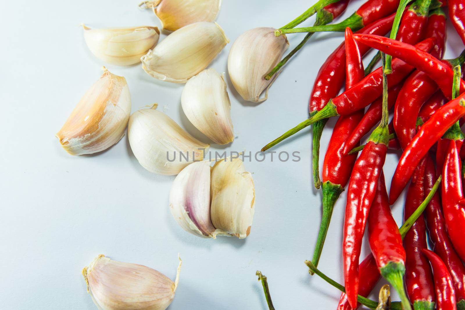 Red hot chilli and garlic  on white background