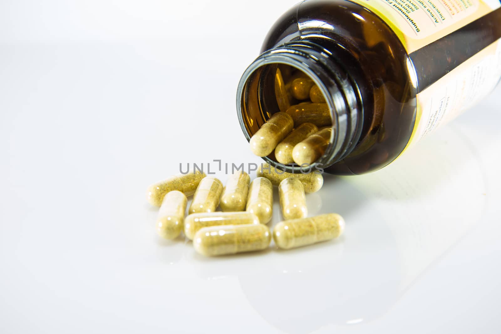 Many pills and tablets isolated on white background