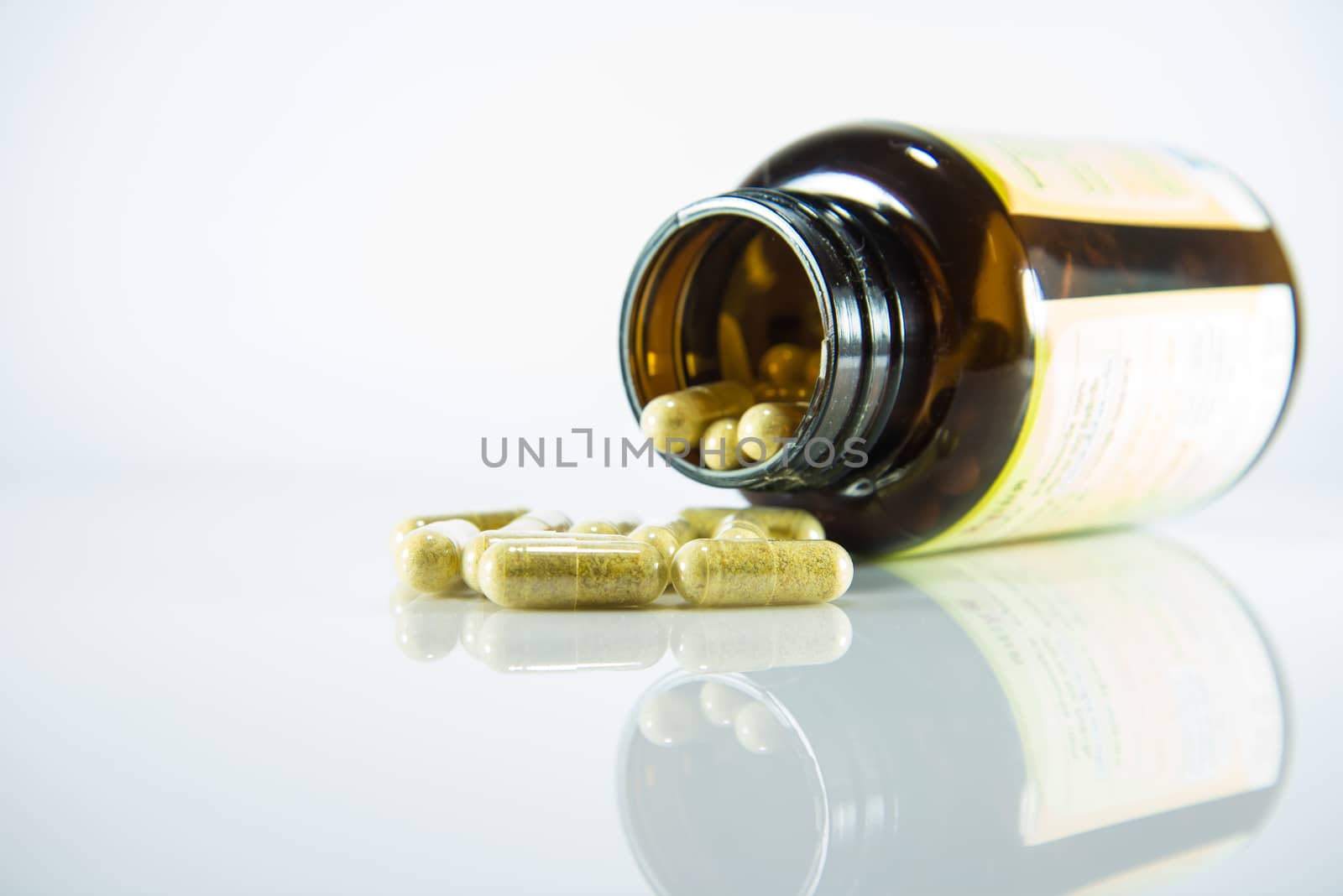 Many pills and tablets isolated on white background