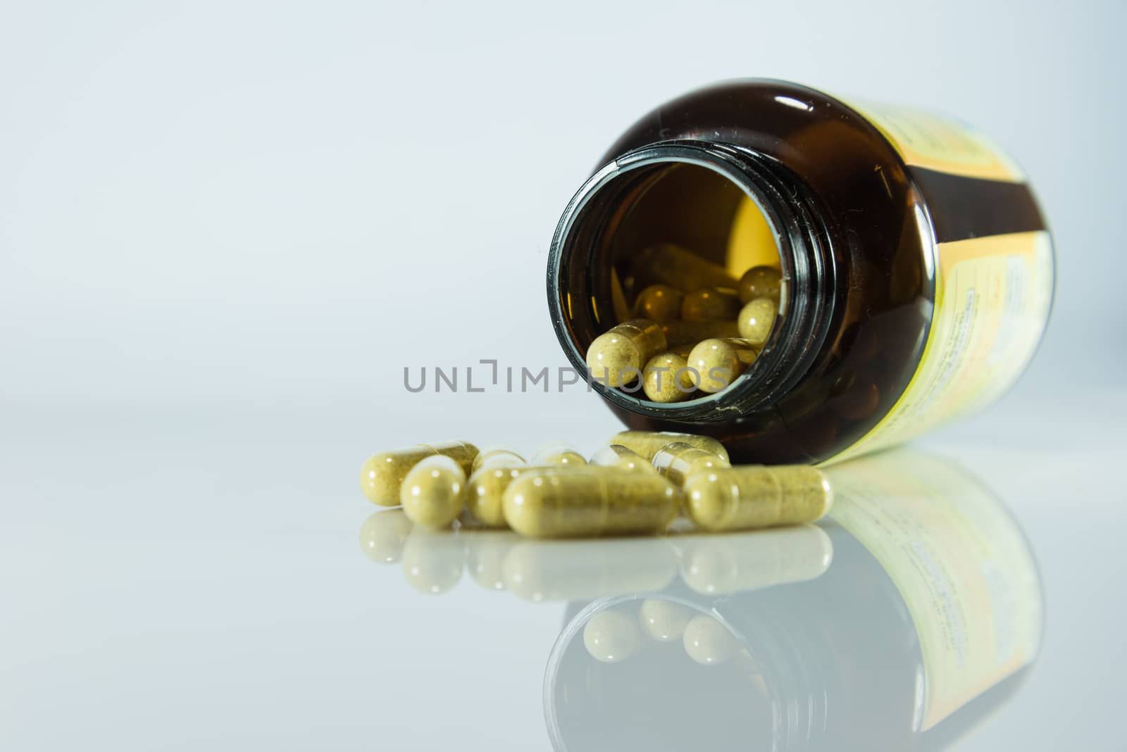 Many pills and tablets isolated on white background