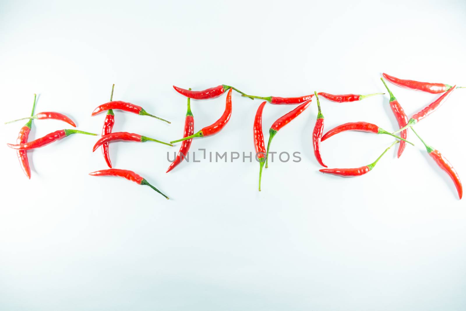 Red hot chilli on white background
