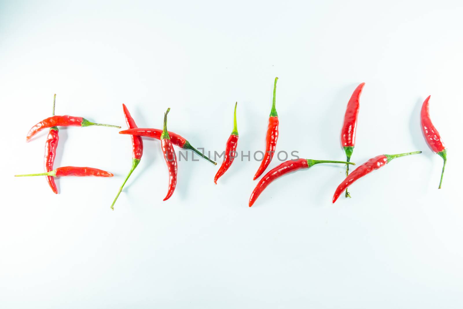 Red hot chilli on white background