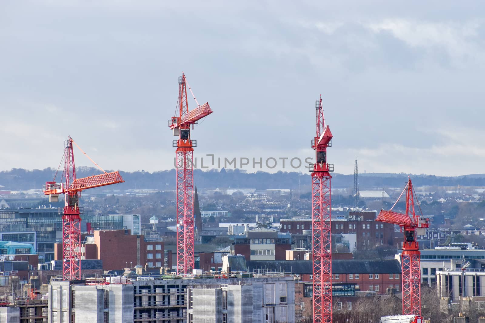 Dublin, Ireland - January 13, 2020: Cranes over Dublin city skyline highlighting Dublins current housing crisis