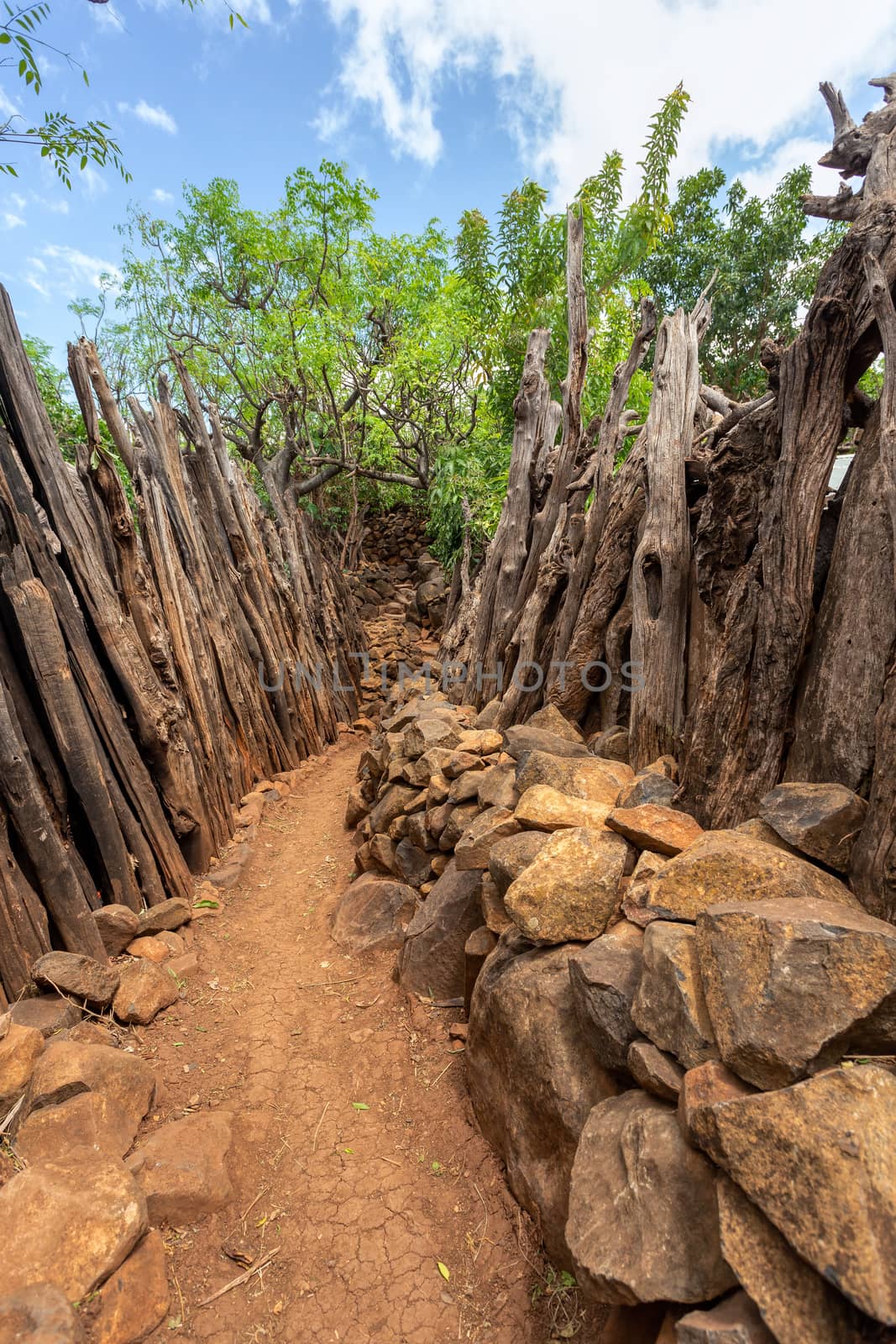 Narrow pathway in Konso, walled village tribes Konso. Africa, Ethiopia. Konso villages are listed as UNESCO World Heritage sites.