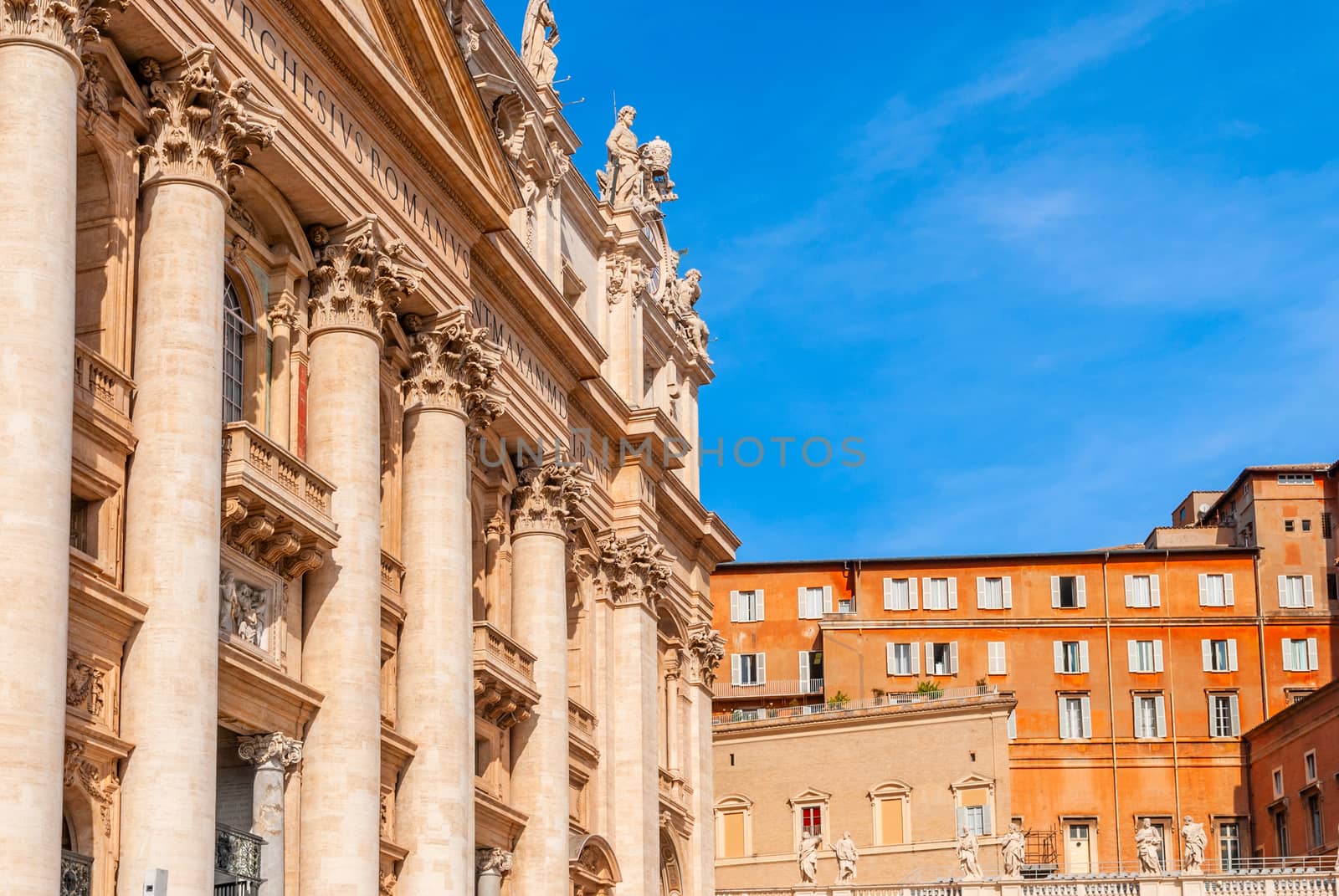 St Peter's Basilica on blue sky background. Vatican, Italy