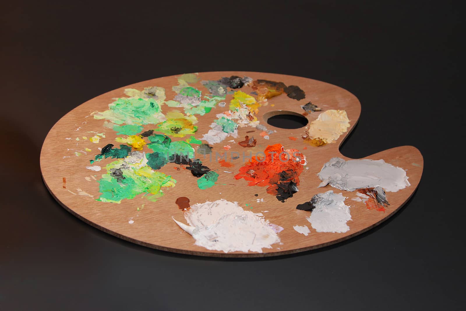 Artist's palette with colorful paints