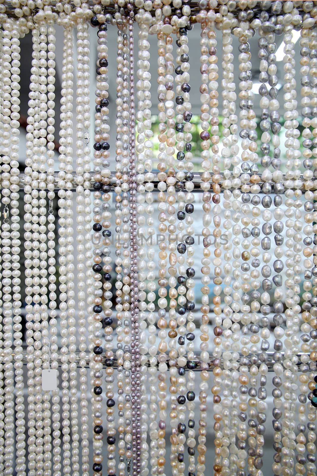 Background from multi-colored pearl jewelry