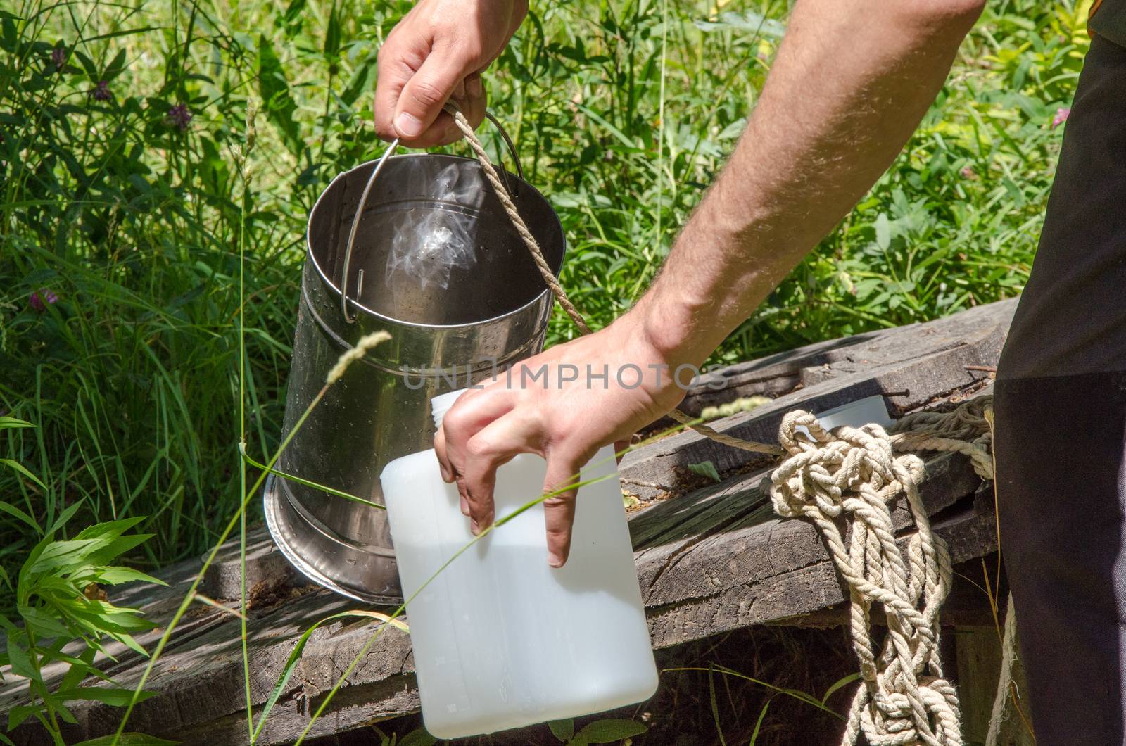 Take samples of water for laboratory testing. The concept - analysis of water purity, environment, ecology