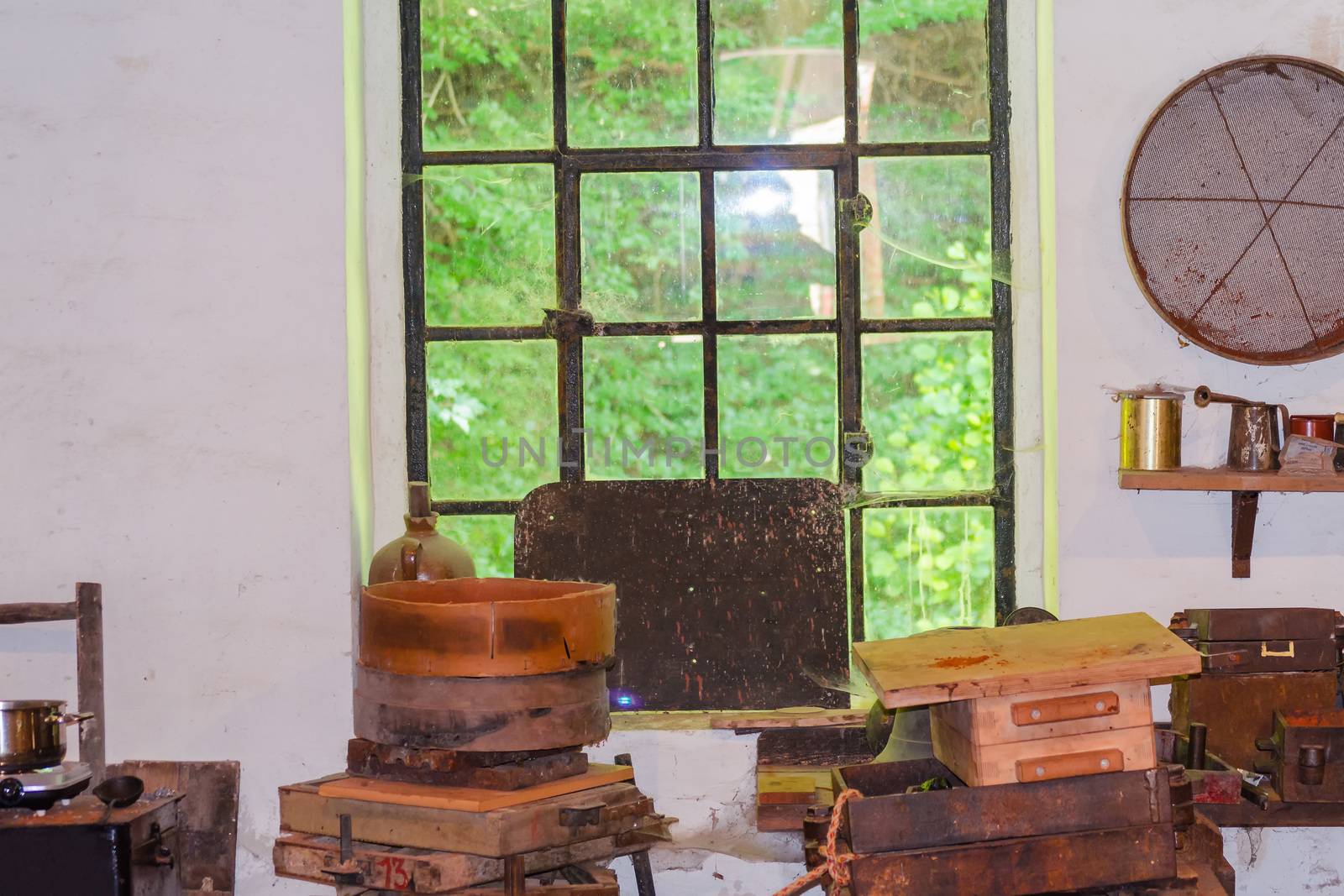 View into an old workshop. Old blacksmith iron foundry