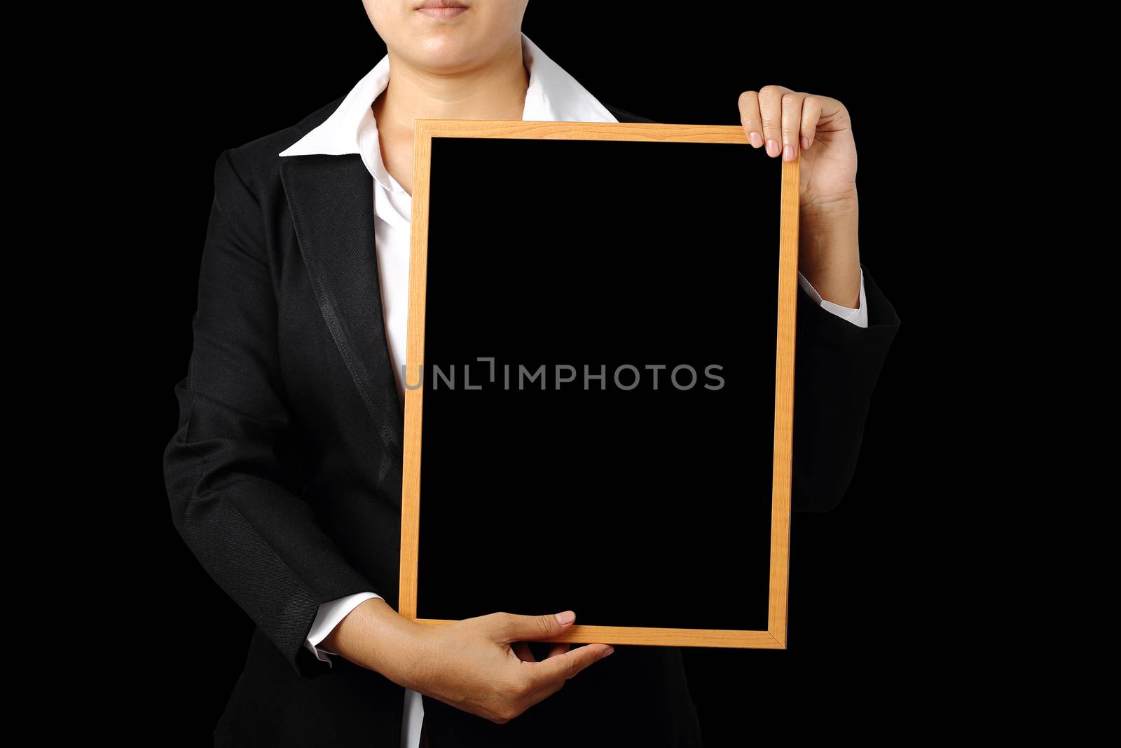 Asia businesswoman showing blank signboard isolated on black background, clipping path.