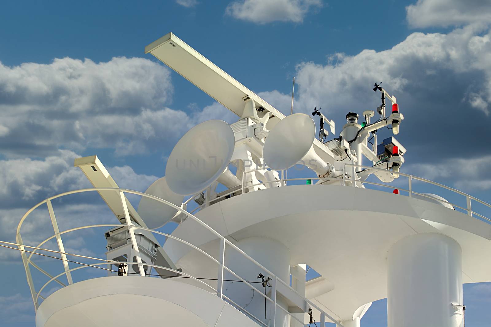 Top of a cruise ship showing satellite and sonar receiver