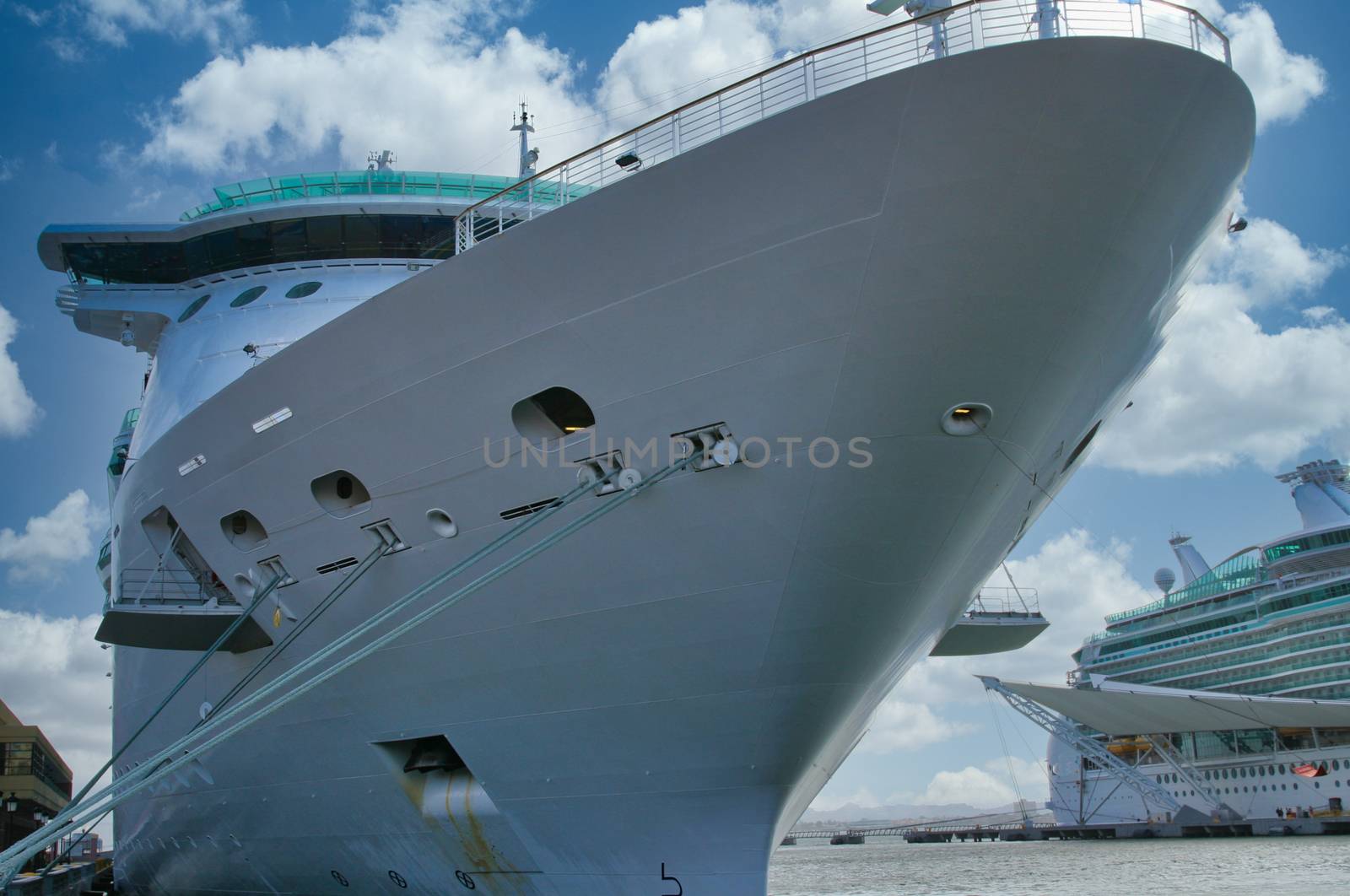 Huge cruise ship tied up at a dock