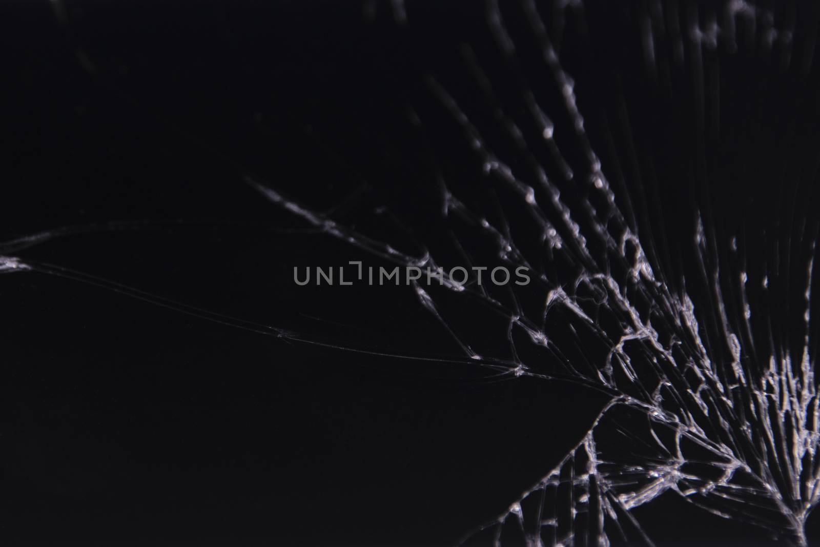 crash glass black background abstract broken closeup