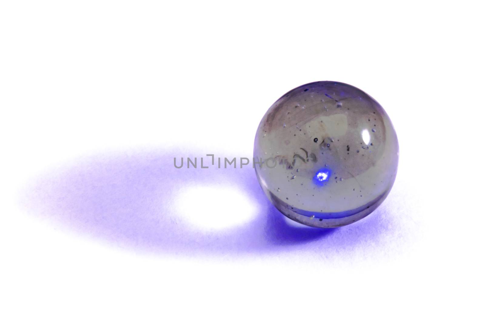 purple glass ball on white background isolated