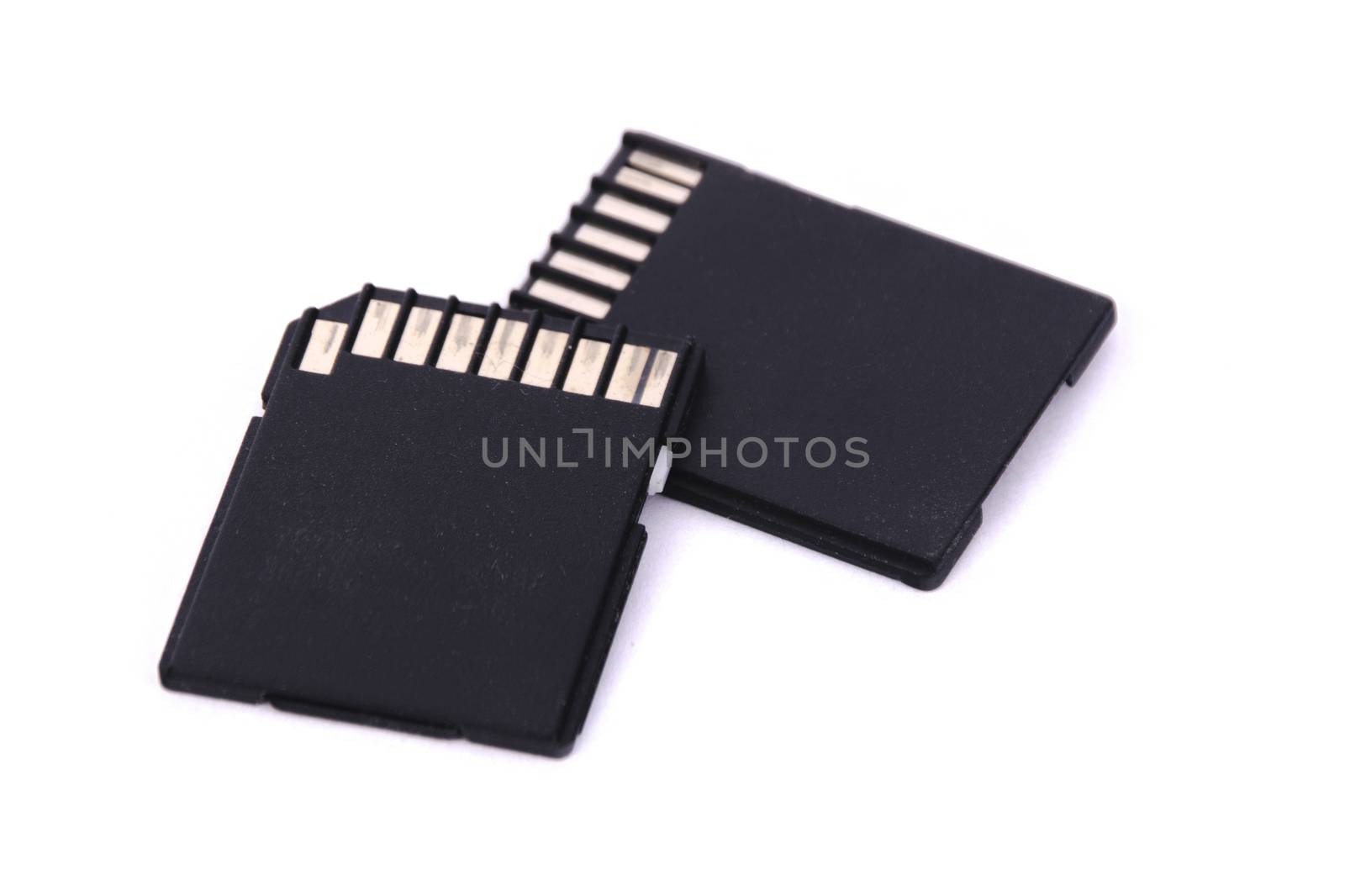 two black SD card digital storage device on white background isolated