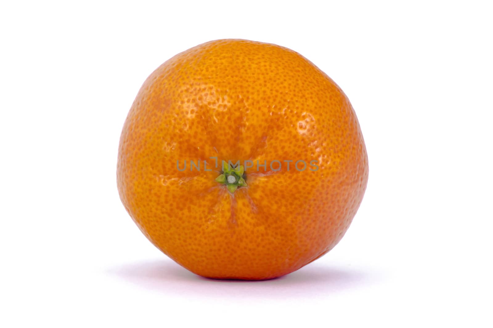 tangerine, whole on a white background. isolated. macro mode.