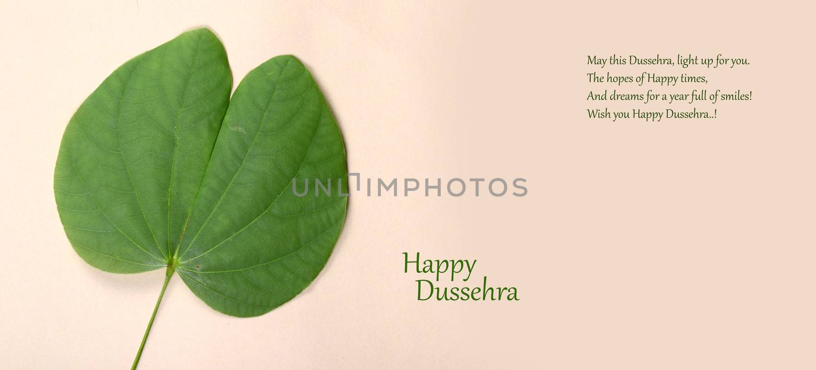 Indian Festival Dussehra, showing golden leaf . Greeting card.