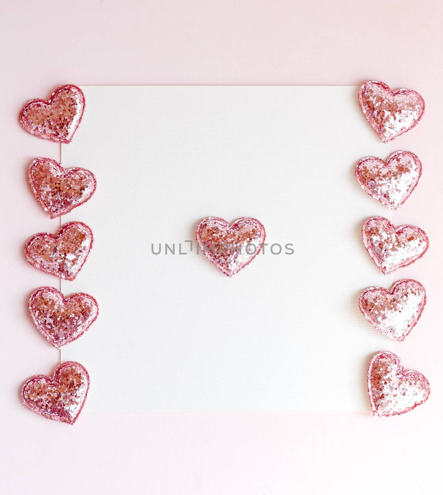 Background with copy space blank on pink background with pink glittered hearts, eucalyptus branch. White paper top view, flat lay, minimal style. Moke up card. by Denys_N