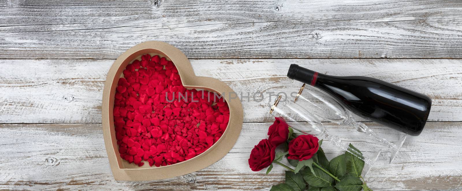 Happy Valentines Day celebration with romantic gifts on white rustic wooden background 